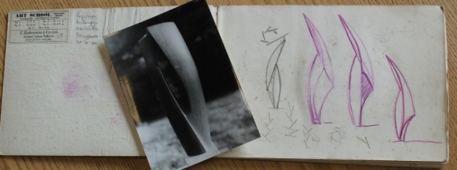 Design sketches and a photograph of a finished piece using the concept